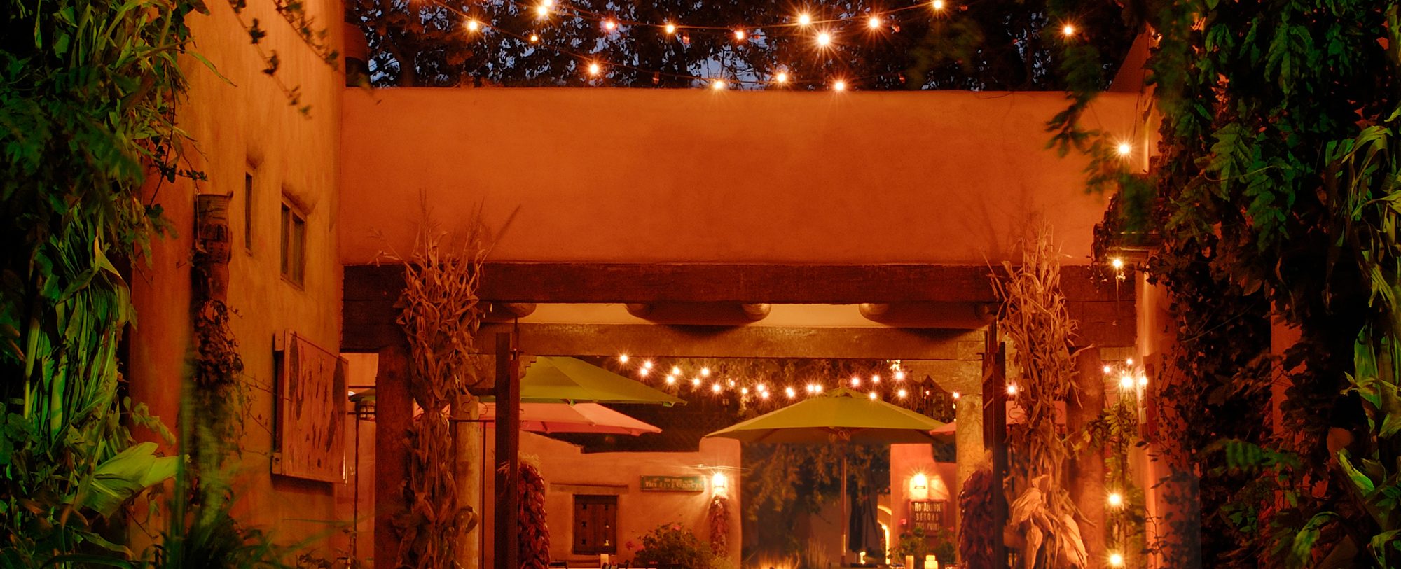 The Pink Adobe Patio at Night